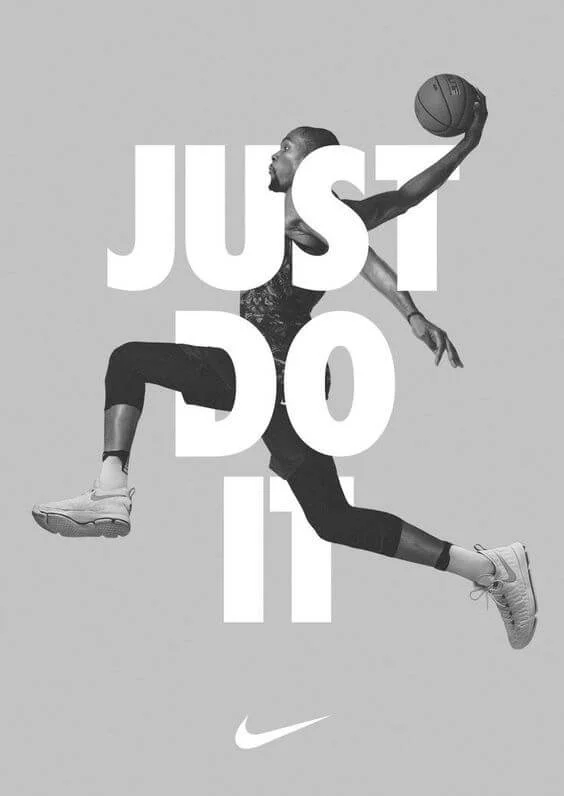 Atleta saltando con balón sobre el lema “Just Do It”, imagen representativa de la campaña publicitaria de Nike creada por Wieden+Kennedy en 1988.